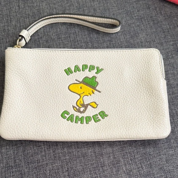 Coach Peanuts leather wristlet Snoopy Woodstock Hapoy Camper NEW - Picture 1 of 10